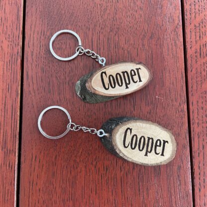 Houten sleutelhanger met tekst